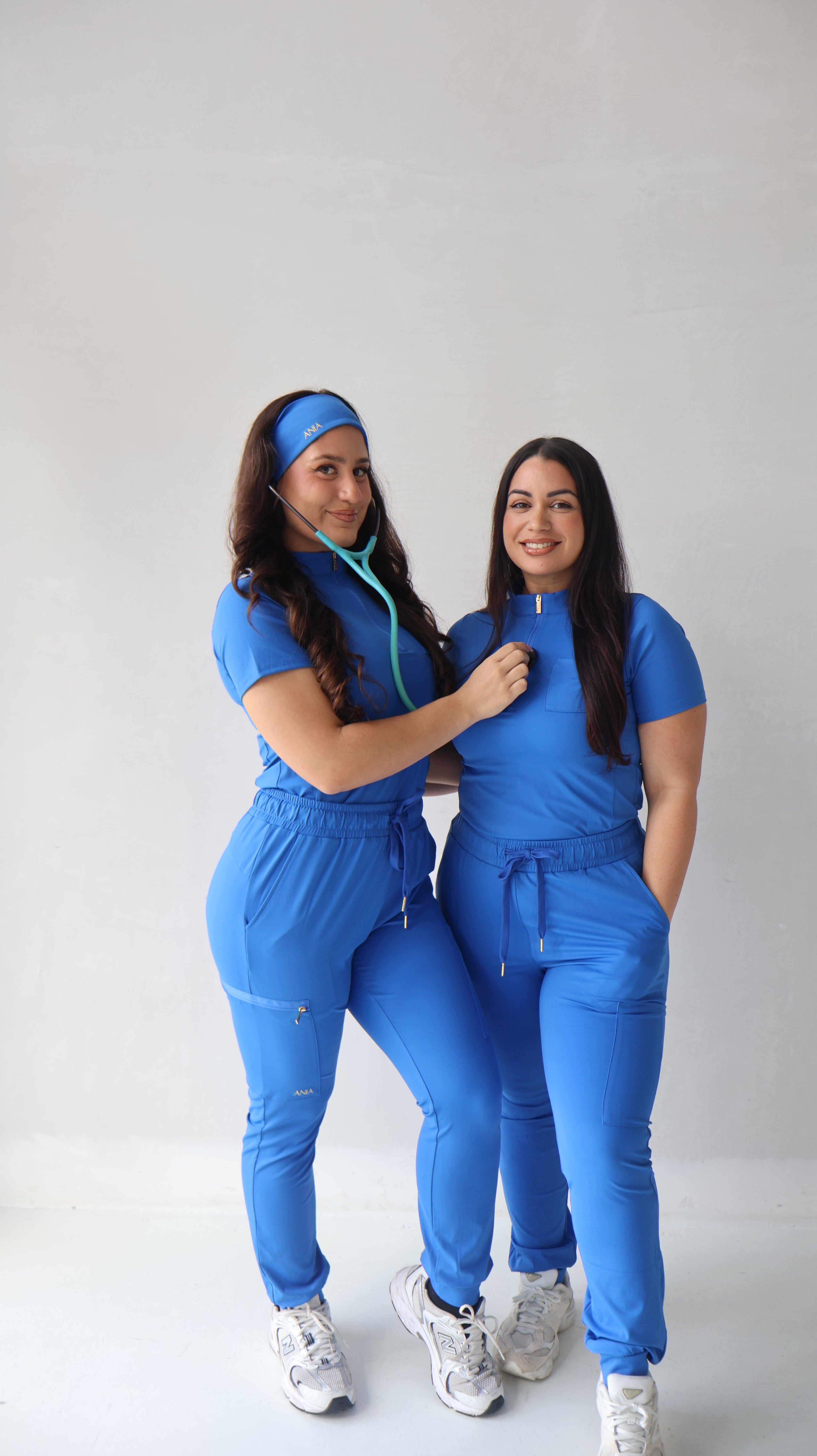 Royal blue quarter zip mock neck scrub top