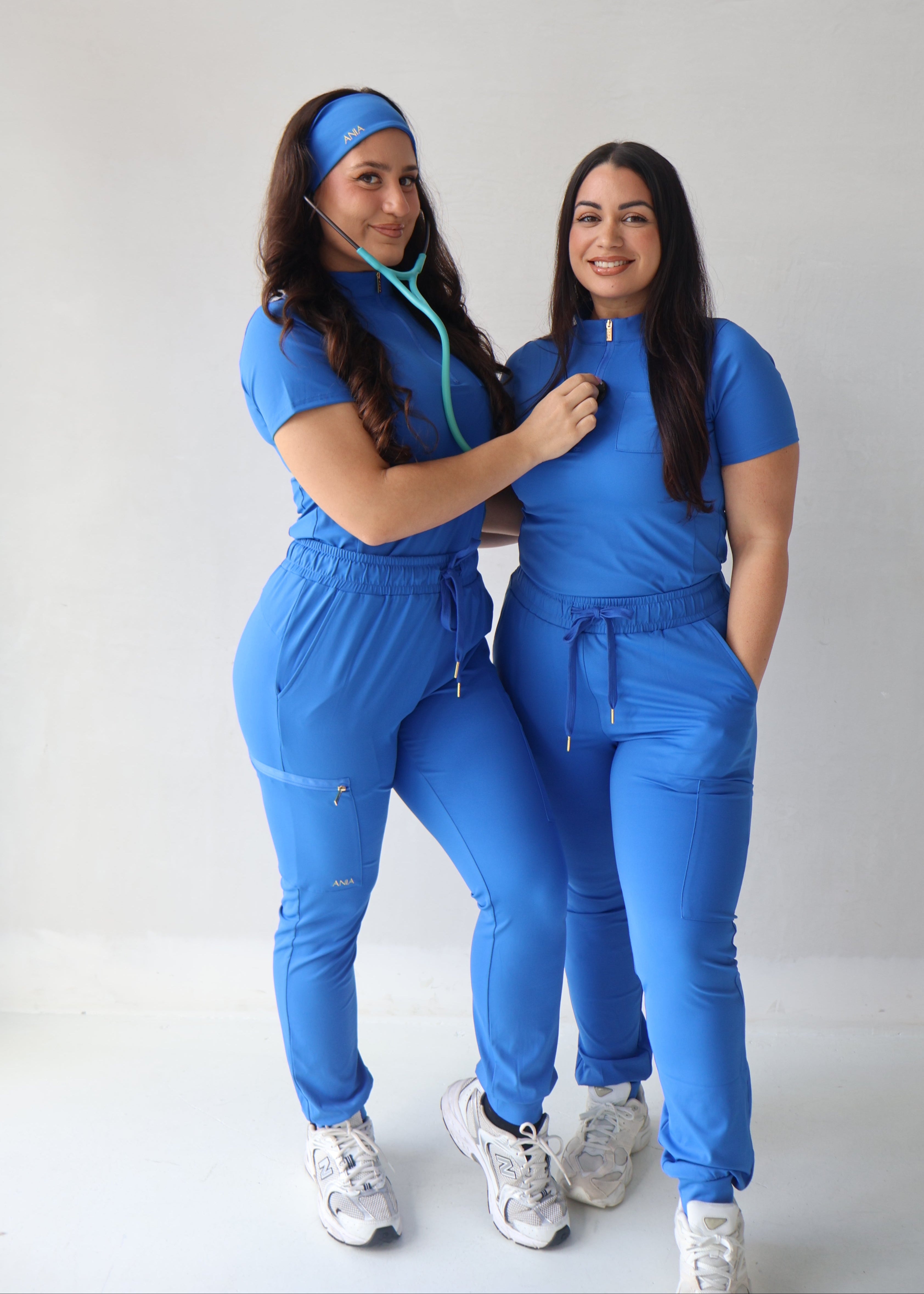 Royal blue quarter zip mock neck scrub top